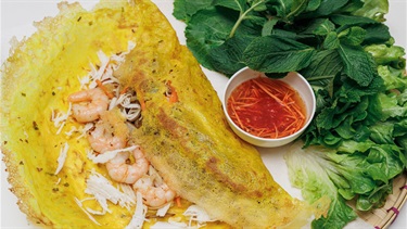 Try the Bánh Xèo - a traditional pancake served with all the trimmings!