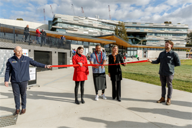 Ribbon cutting at the new Henry Turner South Reserve Pavilion with local member for Footscray Katie Hall, Mayor Councillor Sarah Carter and Club President Charlie.