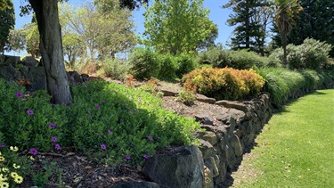 The expertly maintained garden beds are typical for Yarraville Gardens Precinct